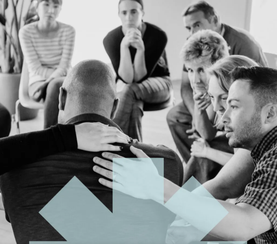 Picture of staff comforting a colleague 2
